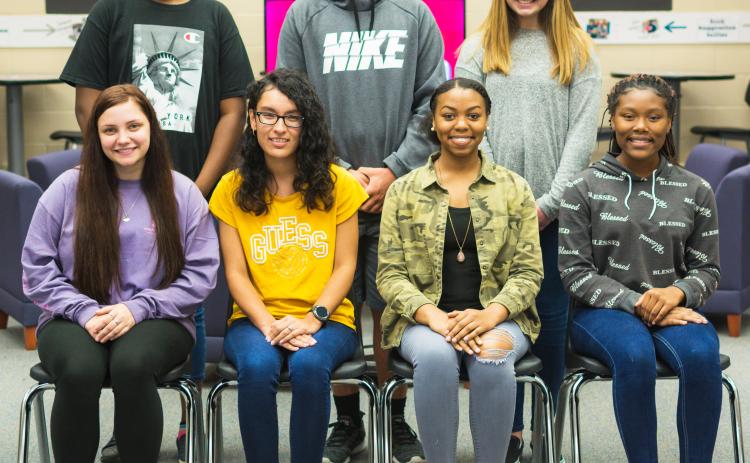 October Students of the Month are (seated) McKenzie Dye, Kimberly Segura, Camille Downer and Koriyana Heard; (standing) Marleigha Dean, Andrew Jaggers and Maryjane Richard. Not pictured, Katrina Bradford