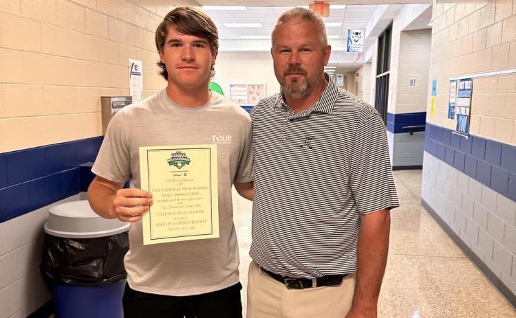 Senior Brady Starrett (left) was selected to compete for the National High School Golf Invitational recently. Starrett is pictured with Head Coach Larry Kesler. 