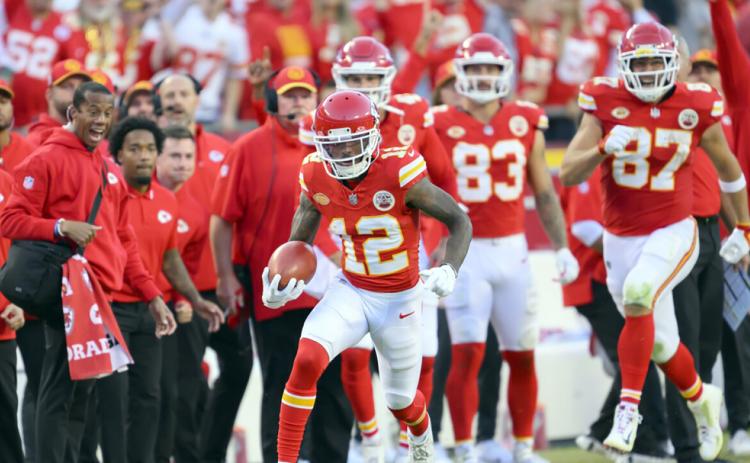 No. 12 Mecole Hardman sprints down the Chiefs sideline during a 50-yard kick return that helped secure the Chiefs’ 31-17 win over the Los Angeles Chargers Oct. 21. The game was Hardman’s first back in a Chiefs uniform after he was traded from the New York Jets Oct. 18. (Photo by Reed Hoffmann of the Associated Press)