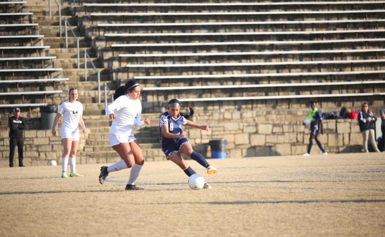 The Devils and Lady Devils soccer teams are scheduled to kick off the new Spring Sports season with a scrimmage against Lincoln County in the Granite Bowl Feb. 2. (File photo by Wells)