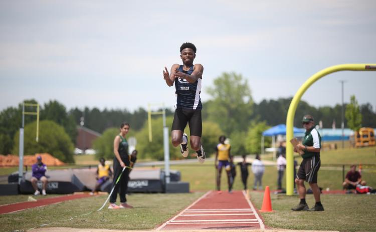 D.K. Winn finished second in triple jump during Elbert’s meet in Madison County March 21. The Devils and Lady Devils track teams are scheduled to continue their season in Homer this week. (File Photo by Wells)