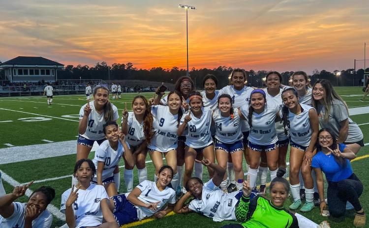 The Lady Devils soccer team poses for a team picture after picking up a region win over Barrow Arts and Sciences Academy. The Lady Devils are scheduled to see Commerce tonight as they try to secure a playoff spot. (Photo courtesy of ECCHS Lady Devils soccer)