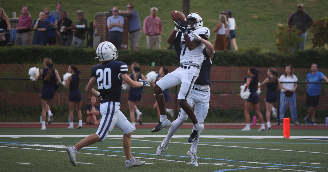 D.K. Winn makes a leaping catch in double coverage during Elbert County’s 45-40 win over Mount Vernon Sept. 29. (Photo by Wells)