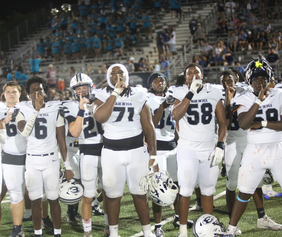Elbert County players (L-R) Colton Thigpen, Runt Mattox, Harrison Matthews, Aiden Sims, Kiyon Hughes and Nazir Shumaker pose after their first win of the season. (Photo by Bo Underwood)