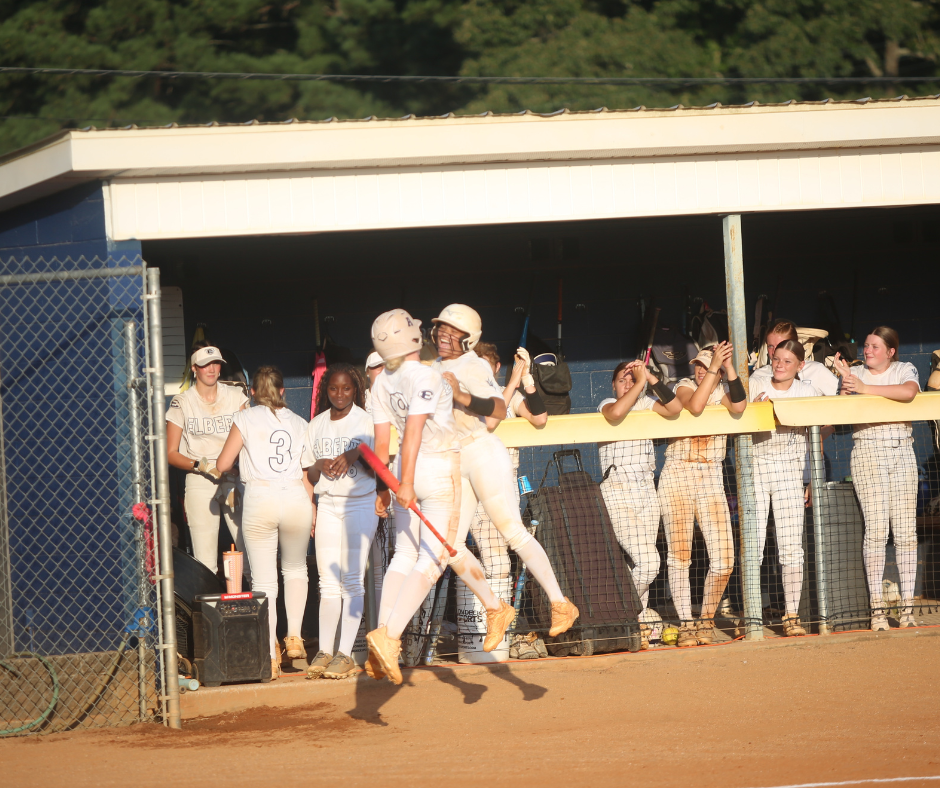 Audrey Lunsford (9) and Ky Dubose (11) celebrate against Hart County. (Photo by Bo Underwood)