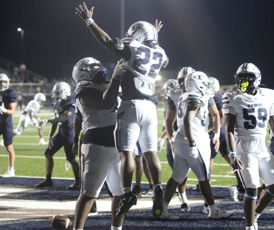 Petey Allen (22) and Aiden Sims (71) celebrate Elbert County’s first touchdown of 2026. (Photo by Bo Underwood)