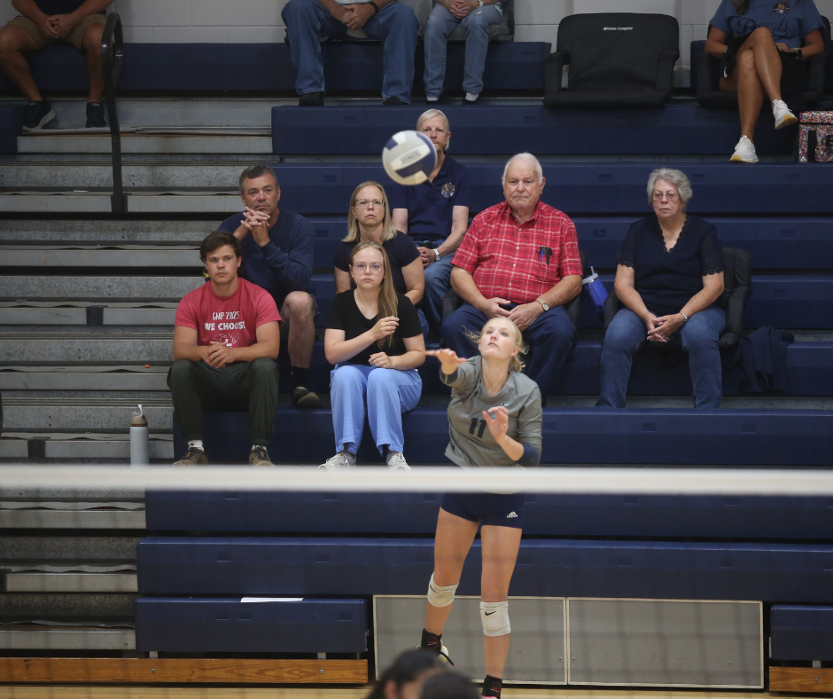 Sidney Gailey serves the ball. (Photo by Bo Underwood)