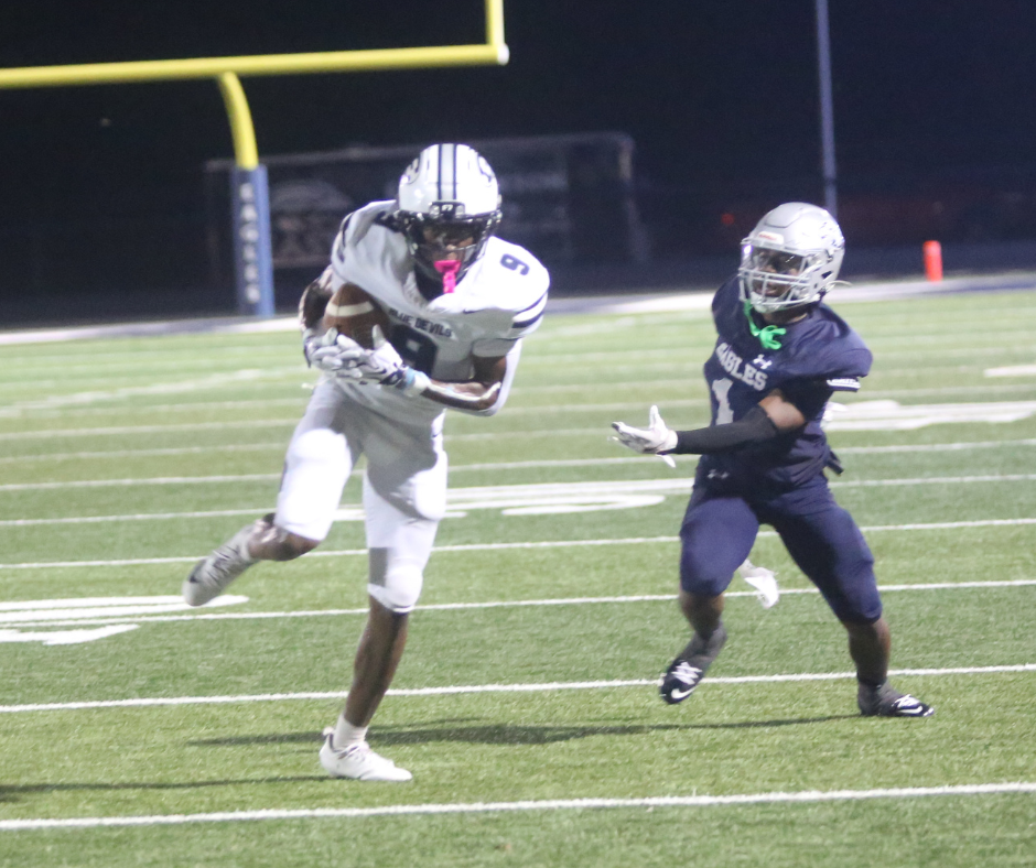 Braylen Huff (9) picks the ball off. (Photo by Bo Underwood)