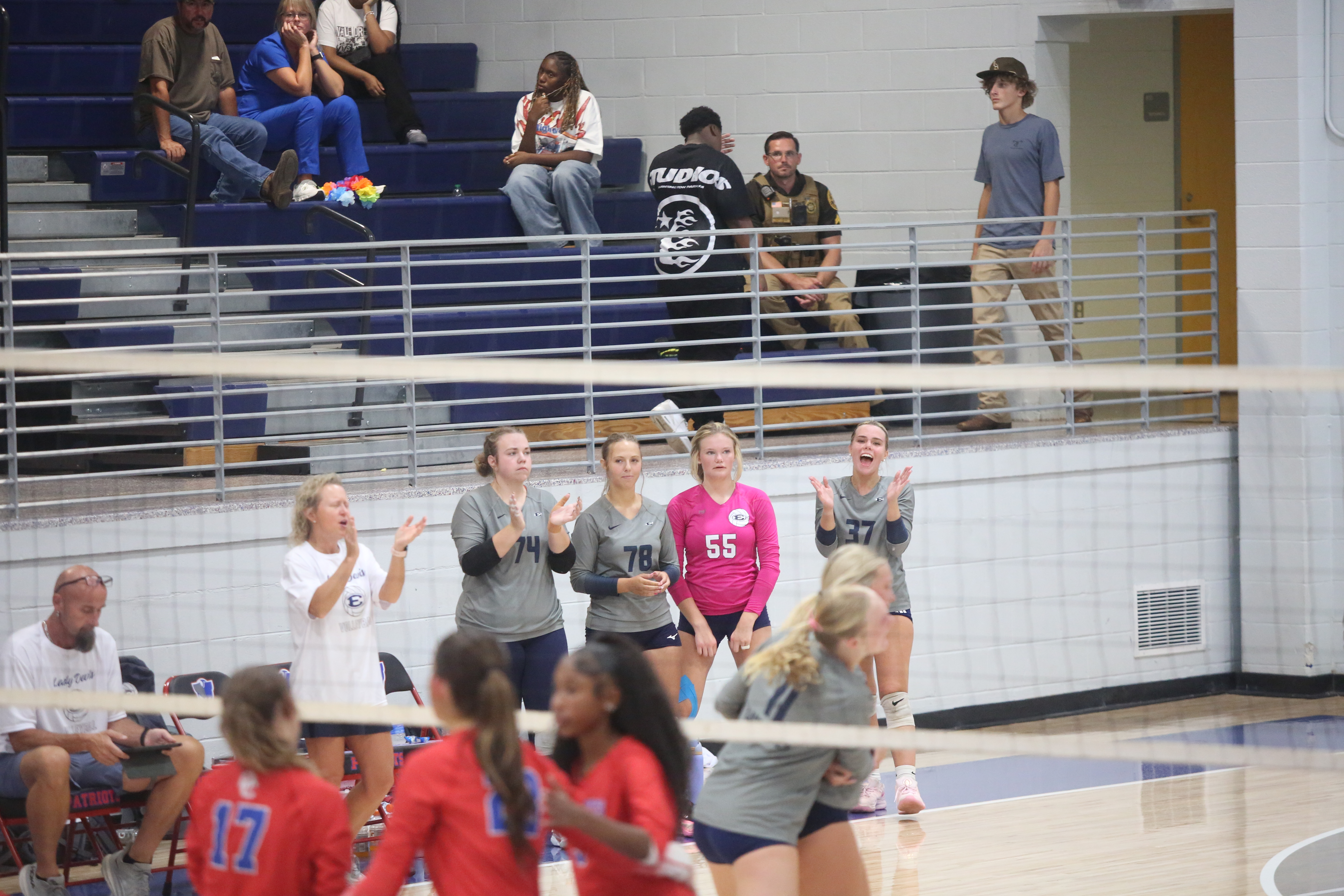 Elbert County volleyball players celebrate from the bench. (Photo by Bo Underwood)