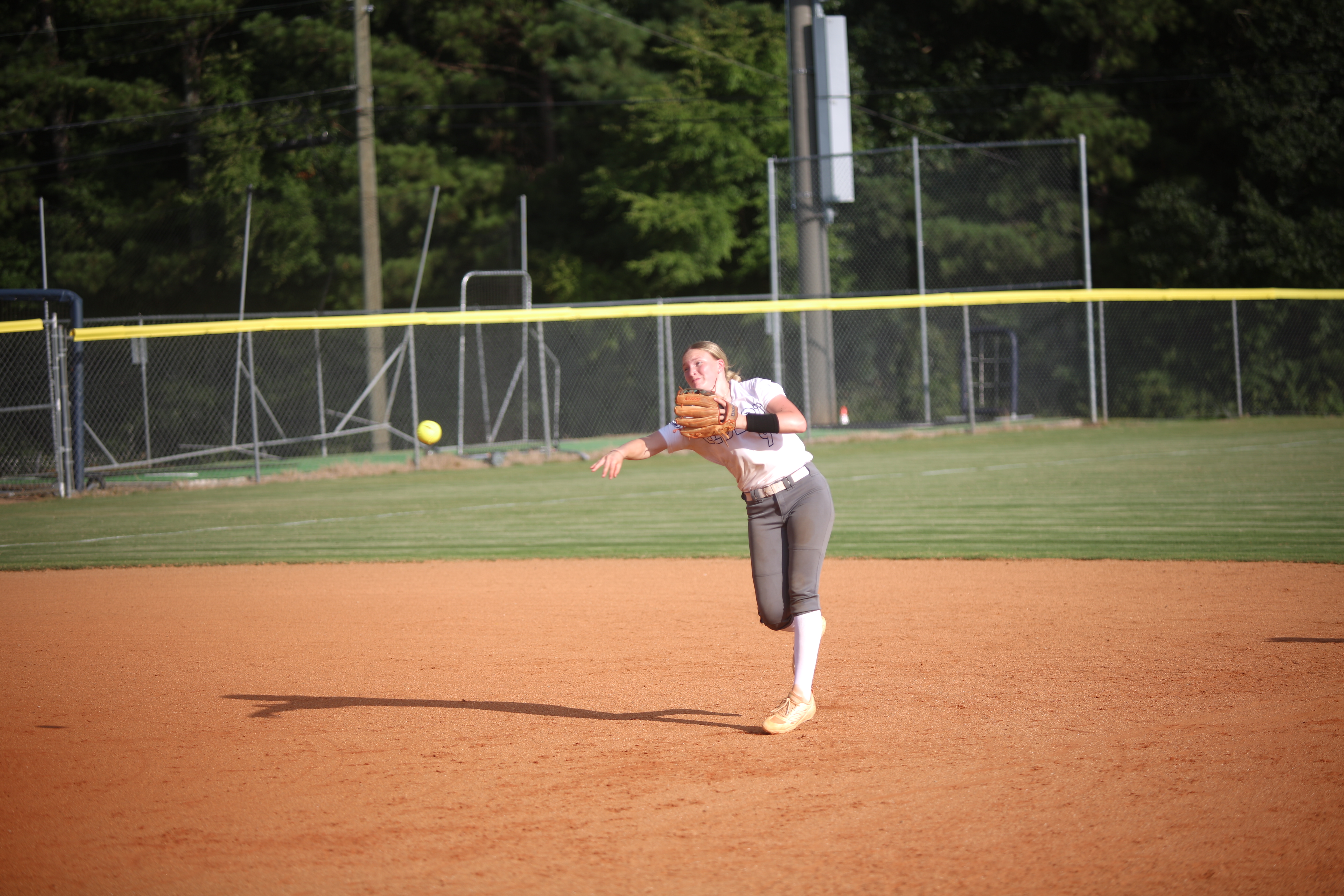 Audrey Lunsford makes a throw from shortstop. (Photo by Bo Underwood)