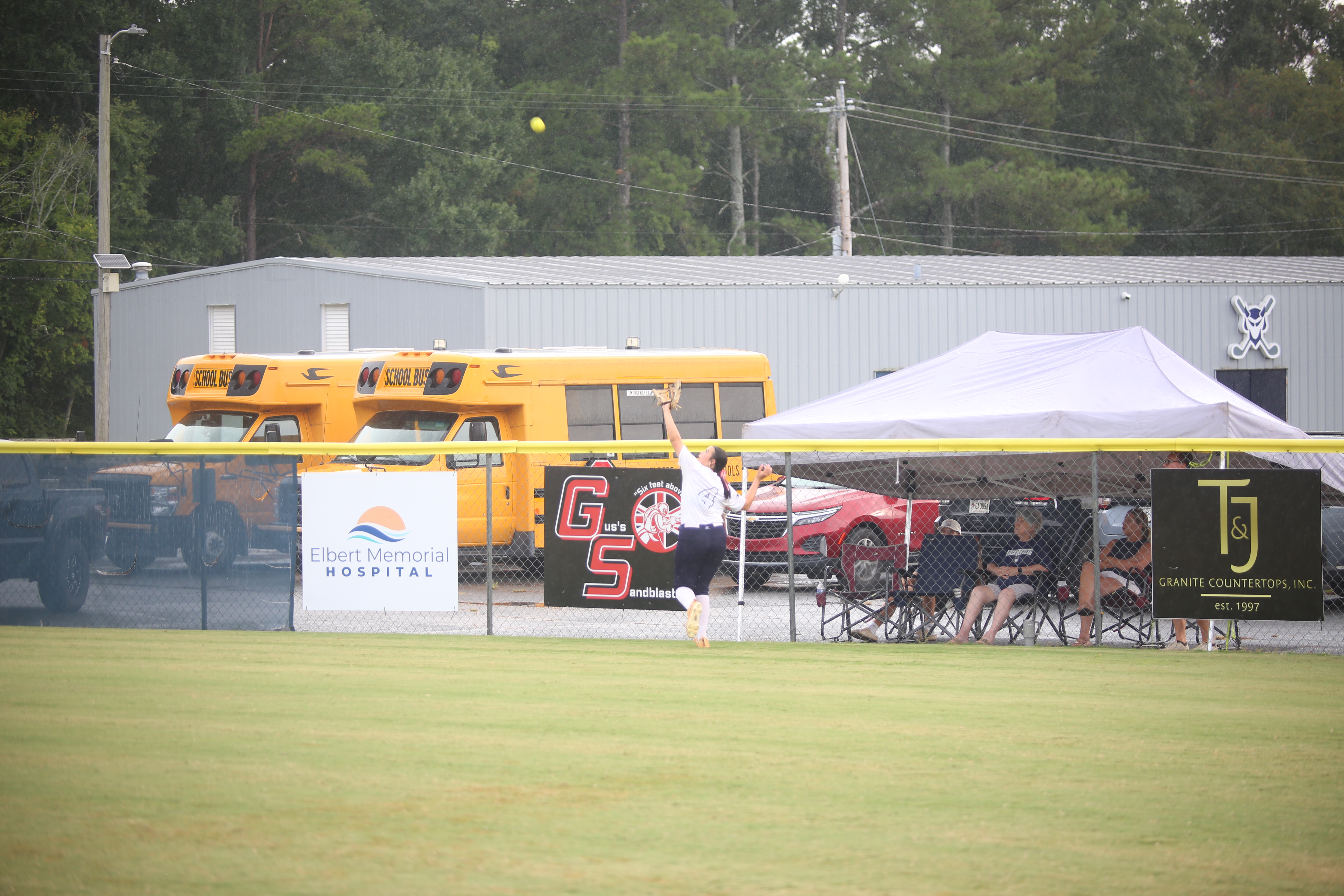 Carlee Brown tracks down a ball in deep right field. (Photo by Bo Underwood)