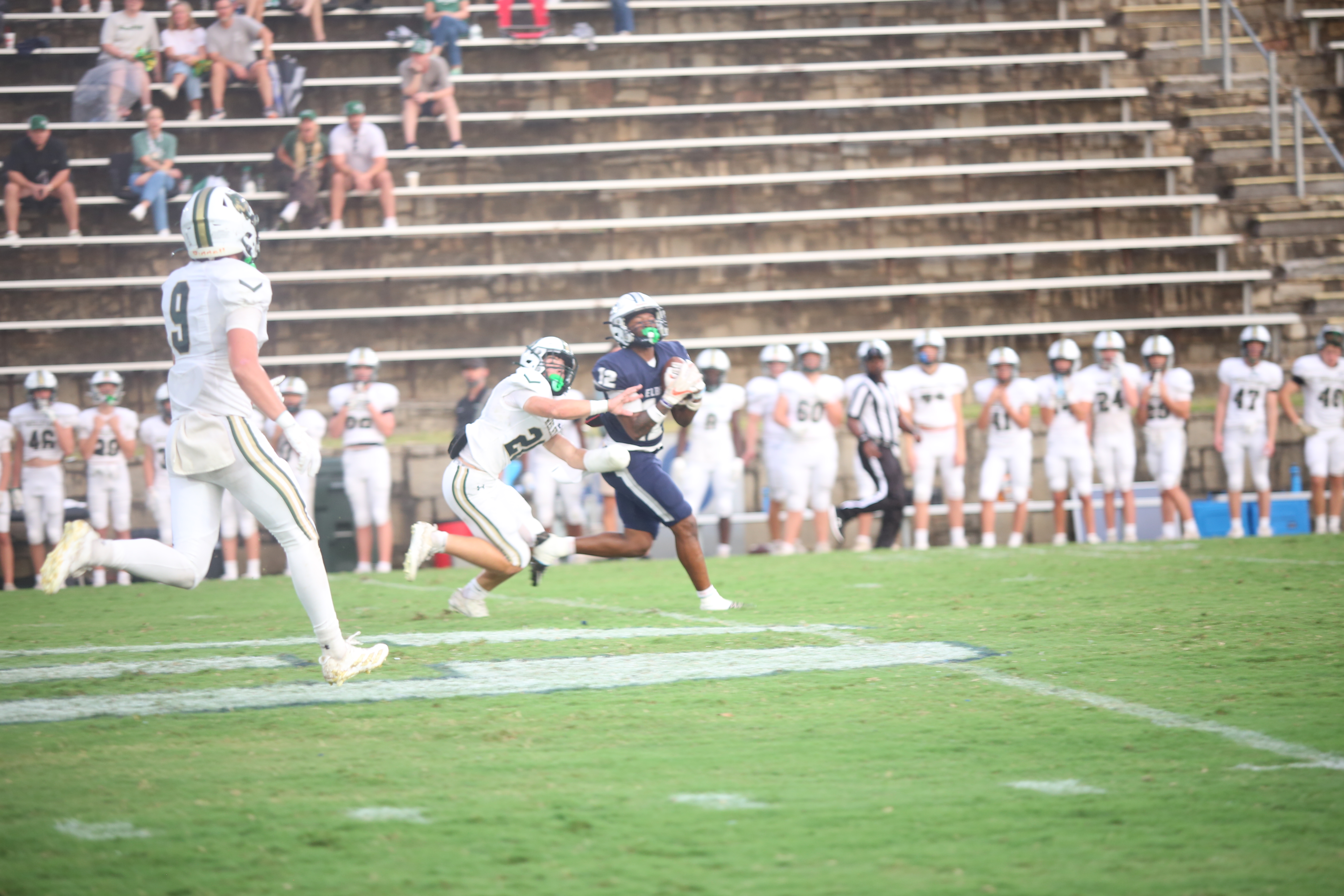 Exavier Jones hauls in a deep pass. (Photo by Bo Underwood)