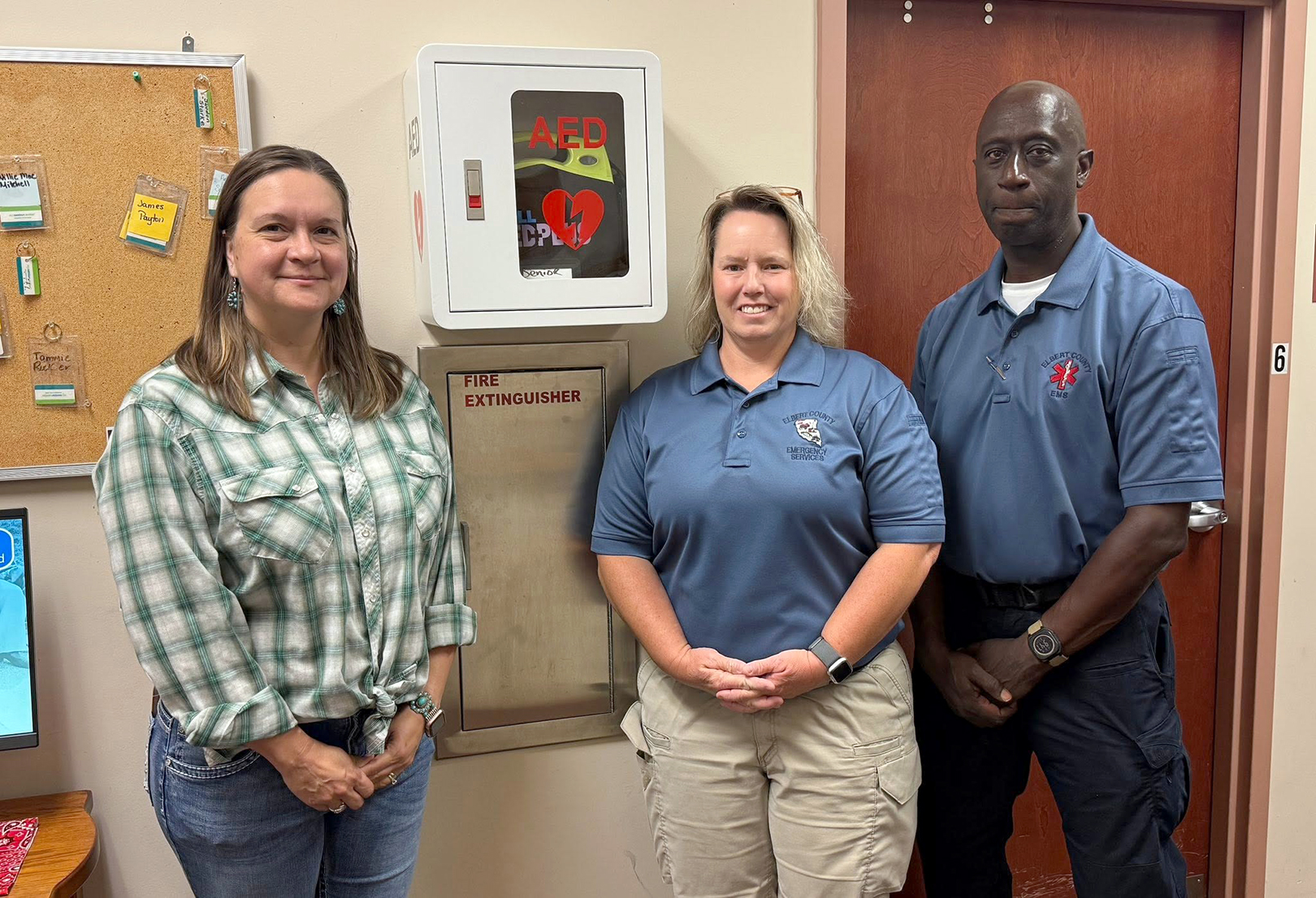 Pictured with the new AED at the Elbert County Senior Center are (L-R) Lisa Dixon, Beth Seymour and Spencer Strong. (Photo courtesy of Elbert County EMS)