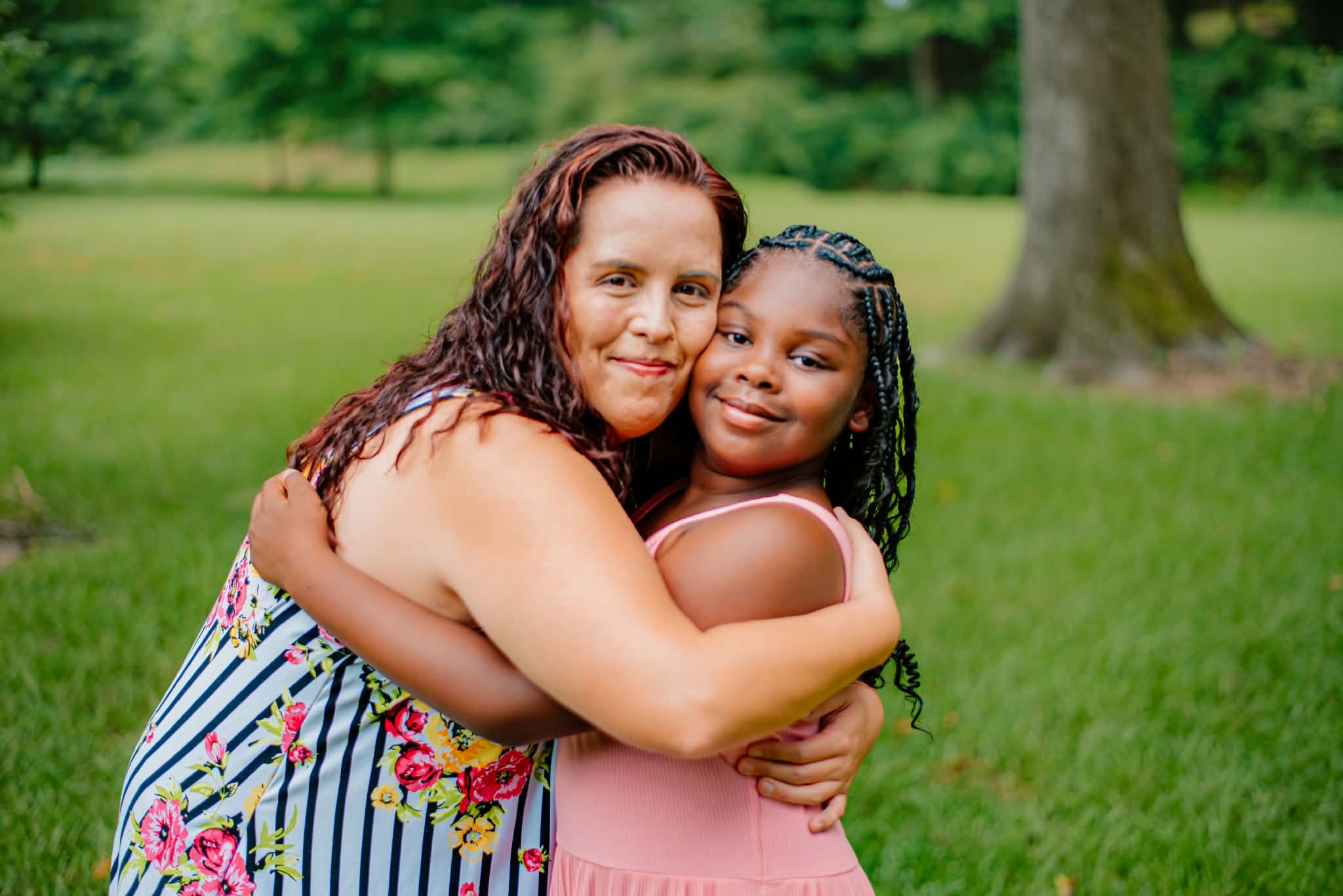 Victoria (left) and Bree (right) Carroll-Jave embrace after a multi-year adoption process. (Photo courtesy of Victoria Carroll-Jave)
