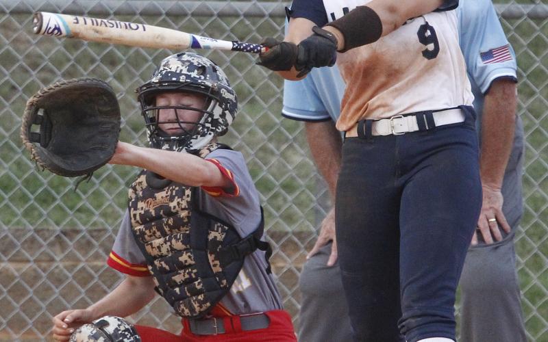 Lady Blue Devil senior Morgan Cavanaugh connects for a single in Elbert’s 8-7 seventh-inning win over Clarke Central Aug. 20 at King Field in Elberton (Photo by Cary Best)