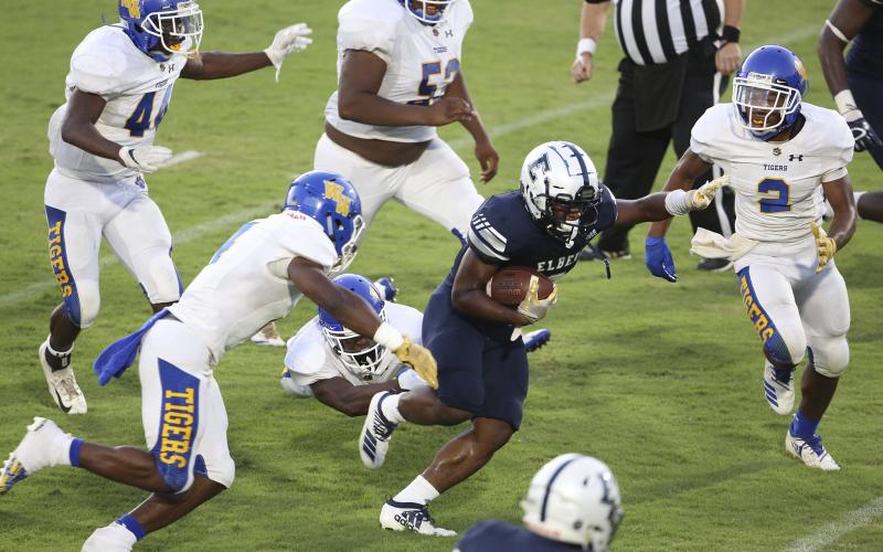 Blue Devil senior running back Shun Allen alludes Tiger defenders on his way to a 134-yard, two-touchdown performance during Elbert County’s 28-14 victory over Washington-Wilkes Aug. 30 in Elberton. (Photo by Dan Giles)