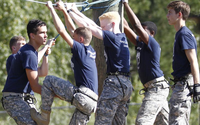Elbert County JROTC Male Raiders team members (L-R) Logan Vickery, Briley Jenkins, Grady Thomas, Jordan Teasley, D.J. Veal and Nicholas Smith compete in the rope bridge event during a meet at Jackson County High School Sept. 21 in Jefferson. (Photo by Cary Best)