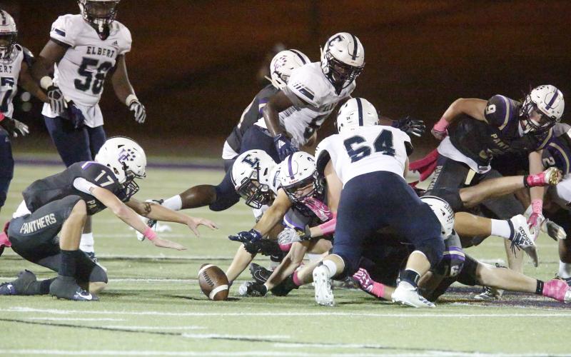 Blue Devils and Panthers fight for a loose ball in a Region 8-AA match-up which had three fumbles and three interceptions in Union County’s 35-14 win over Elbert County Friday night Oct. 4 in Blairsville.