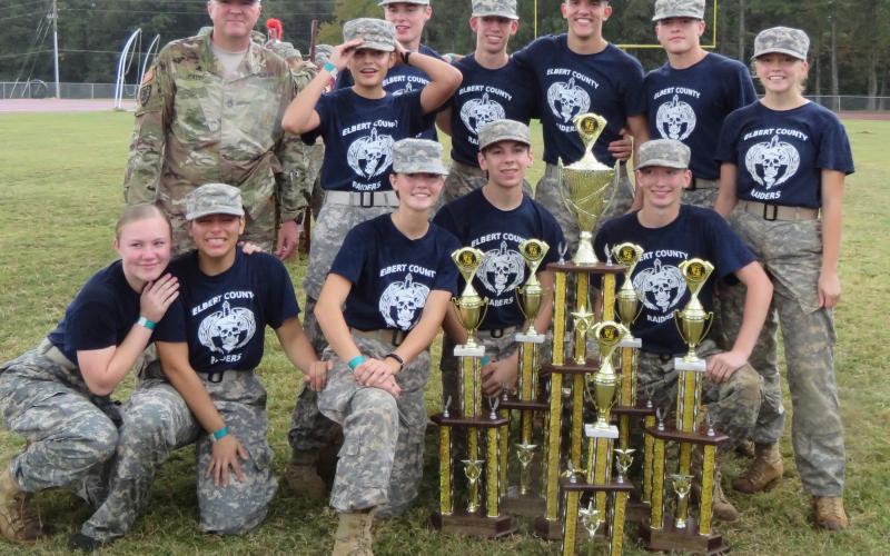 Elbert County Mixed JROTC team members (front, L-R) Haylee Marunich, Jamitel Bernier, Maelynn Ruff, Mathew Hernandez, Justin Bastyr; (back) Sgt.  Cadd, Marilynn Flores, Brandon Nestor, Gabriel Pless, Dean Blanchard, Thomas Vaughn and Makayla Ingle pose with the 2019 Mixed Team Raiders State Championship Oct 26 at Griffin High School. (Photo special to The Star)