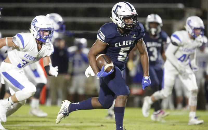 Blue Devil junior linebacker C.J. Tate returns a fumble 40 yards for a touchdown during Elbert County’s 48-7 region win over Banks County Nov. 8 in the Granite Bowl. (Photo by Cary Best)