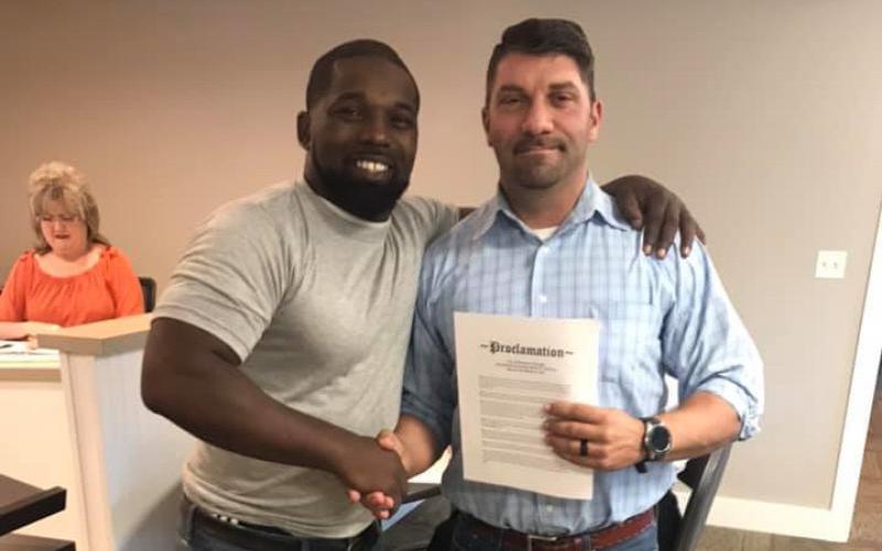 File photo of Pete Gibbons (right) with Mecole Hardman Sr.