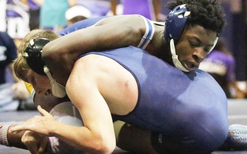 Mat Devil junior Jamal Rucker picked up his 100th career win Nov. 27 at St. Pius High School. (File photo by Cary Best)
