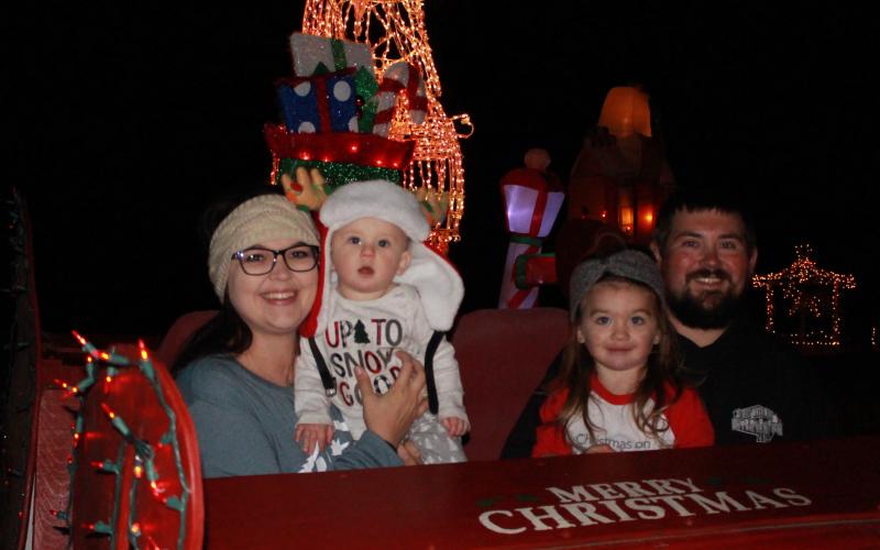 The Lunsfords – (L-R) Brittney, Charlie, Stella and Kyle – begin decorating two months ahead of Thanksgiving to open the family’s farm light display in Bowman. (Photos by Scoggins)