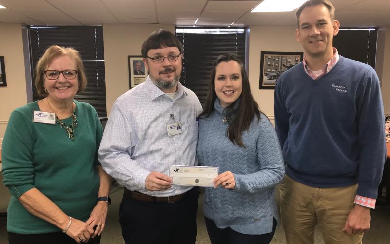 At a $500,000 check presentation last week were (L-R) Elbert Memorial Hospital Foundation Executive Director Nancy Seymour, EMH CEO Kerry Trapnell, EMH Foundation Chair Leanne Layne and Hopsital Authority Chairman Daniel Graves. (Photo by Jones)