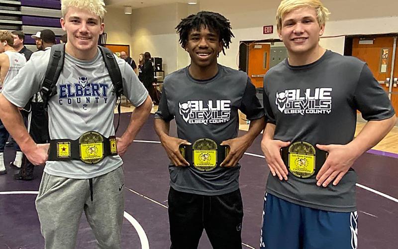 Mat Devils (L-R) Gavin Brady, Tyshawn Hughes and Brice Noggle each won their weight class during the East Metro Invitational Jan. 4 at Monroe Area High School. (Photo courtesy of Blue Devil Wrestling)