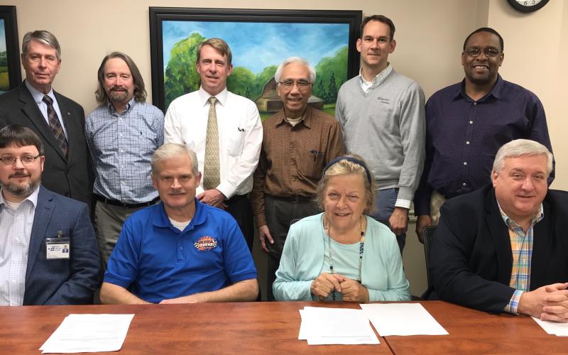 Elbert Memorial Hospital’s Authority Board at the Jan. 28 meeting of the authority included (front row, L-R) Elbert Memorial Hospital Authority Kerry Trapnell, member Tom Steele, member Gail Lavender, member Scott Wilson, (back row, L-R) member Steve Jenkins, member Max Black, member Leon Jourolmon, member Glenn Poon, Authority Chairman Daniel Graves and member Kam McClary. There are two vacancies on the authority. (Photo by Jones)