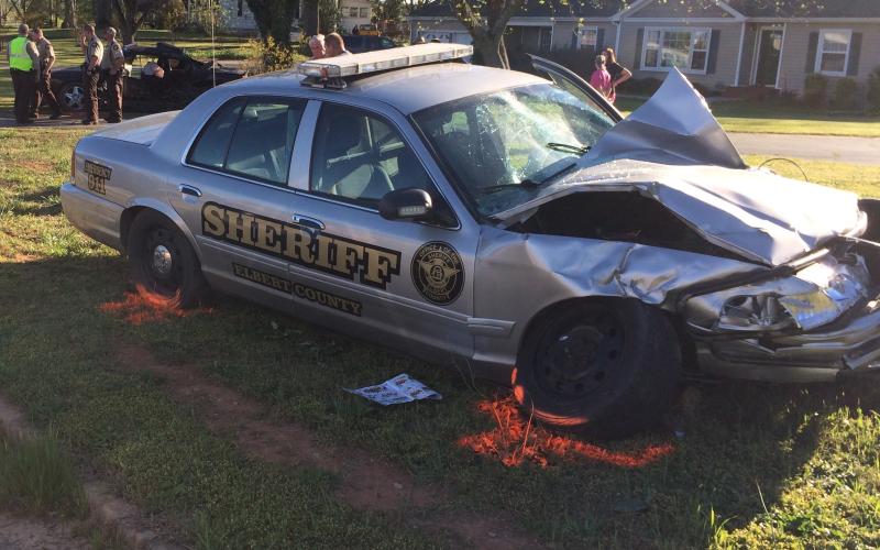 An Elbert County woman, Heather Ratliff Payton, 31, was killed during this accident involving an Elbert County Sheriff’s vehicle (foreground) in April of 2017. Payton’s vehicle, in the background, rotated counter-clockwise 180 degrees after impact and she was thrown from the vehicle, according to a report of the accident released by the Georgia State Patrol. (Photo by Jones)
