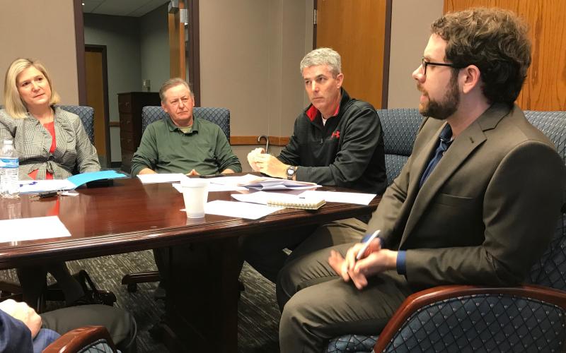 Daniel Dobbins (right), Economic Developer for the Development Authority of Elbert County, Elberton and Bowman, gave his first update to the authority at Athens Tech’s Elbert County campus Thursday morning. Shown at the meeting (L-R) are authority members Dr. Andrea Daniel, Randy Smith and Greg Gunter. (Photo by Jones)
