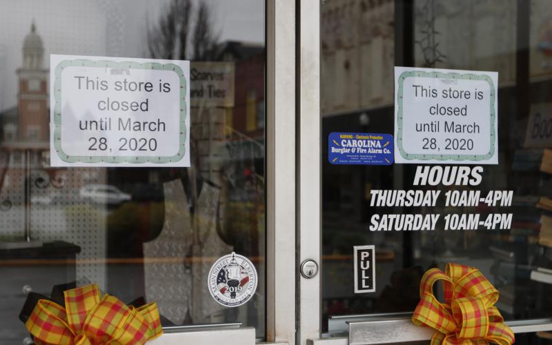 C&amp;M Thrift Store posted signs on their doors to let customers know they would be closed until March 28. (Photo by Scoggins)