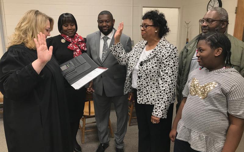 Probate Judge Stephanie Hewell performed a swearing in ceremony last week for new Bowman Council Member Henrietta Williams. Shown are (L-R) Hewell, Williams’ daughter-in-law and son Tanzie Allen and Charles Allen Jr., Williams, Williams’ son Chadwick Allen and Williams’ daughter Kyra Holland. (Photo by Jones)