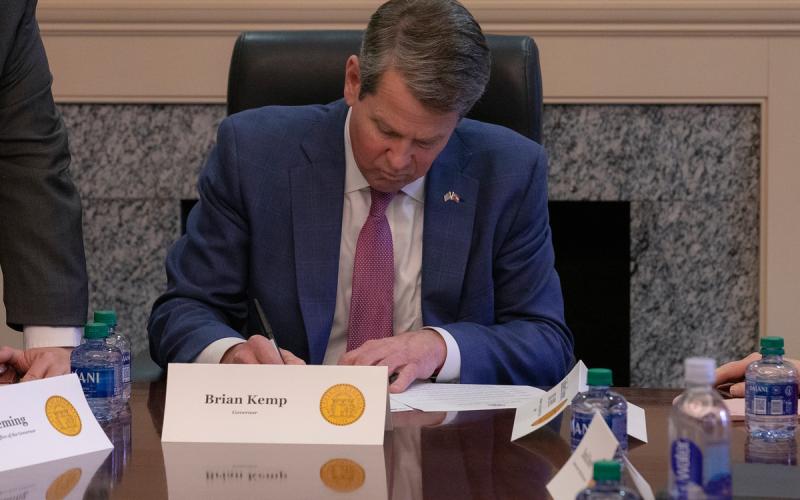 Photo from the office of Gov. Brian Kemp from a coronavirus task force meeting earlier in March