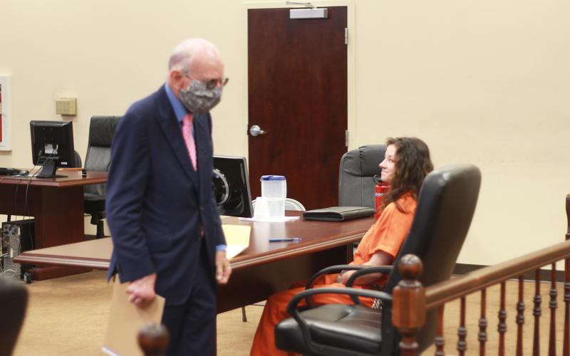 Athens attorney Jim Smith (left) represented Carrie Jill Peppers (right) in a bond hearing in Elbert County Superior Court Tuesday morning. Peppers is charged with second degree murder and second degree child cruelty in connection with the death of her eight-week-old son on May 29. (Photo by Scoggins)