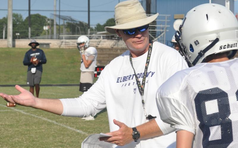 Coach Shannon Jarvis works with wide receivers in a “shell” practice with shoulder pads and helmets on Wednesday, Aug. 5. Elbert County’s scrimmage at Franklin County on Friday, Aug. 21  was eliminated by the Georgia High School Association. (Photo by Jones)