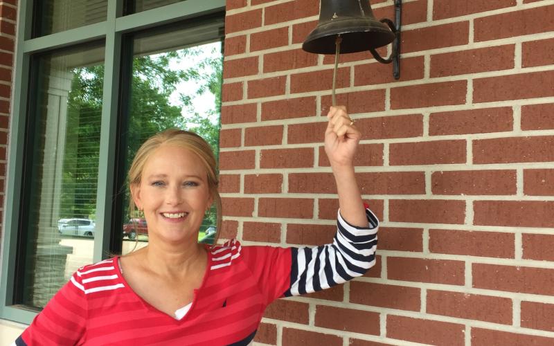 Ringing the bell ... Kelly Gary said she ‘felt so loved’ during a two-year process that allowed her to beat breast cancer.