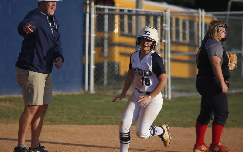 Elbert County Coach Drew Greer waves home Liberty Burnette in the Lady Devils’ game with Rabun County last week. (Photo by Scoggins)