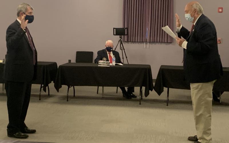 Mayor Larry Guest swore in City Attorney Steve Jenkins Monday night in the first meeting of the year for the council. (Photo by Scoggins)