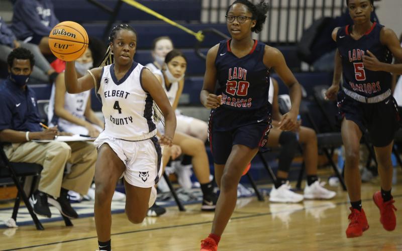 Sophomore Rere Allen takes the ball down the court against Grovetown Dec. 12 in the Elbert County Middle School Gym. (Photo by Scoggins)