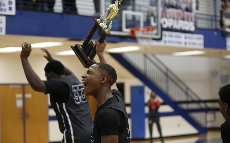 Blue Devil Jamil Burton celebrates the Devils’ Region Championship win at Banks County High School Thursday, Feb. 18. (Photo by Scoggins)