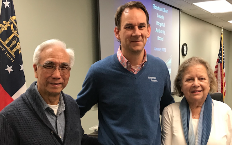 Dr. Glenn Poon (left) and Gail Lavender (right), who combined served 17 years on the Elbert Memorial Hospital Authority Board, were honored by Authority Chairman Daniel Graves at last week’s board meeting. Poon served 10 years on the authority board while Lavender served seven. (Photo by Jones)