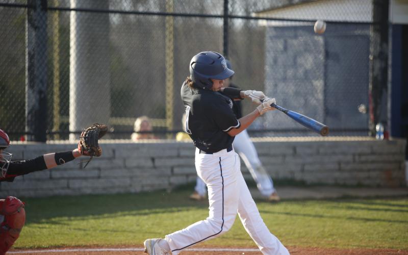 Landen Ingram takes a swing against Clarke Central Friday, March 5. (Photo by Scoggins)