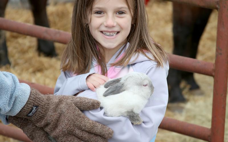 Due to the rainy weather, the Elbert County Chamber of Commerce and Main Street Elberton’s Easter egg hunt, featuring the Easter bunny, was canceled Saturday, April 13. However, another bunny made an appearance during the cold Spring Festival Saturday, April 9. Pictured holding a bunny from Elbert County Farm Bureau during the festival is six-year-old Josie Butler.