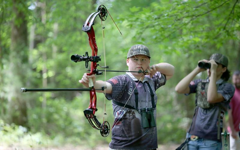 Nathan Hendrix, who is also a senior at Elbert County Comprehensive High School, signed a scholarship to continue his archery career at Emmanuel College after graduation. (Photos by Scoggins)
