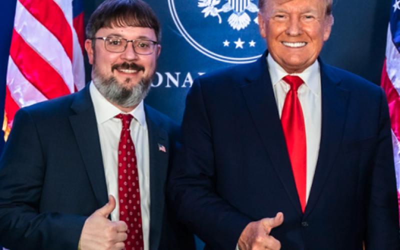 Elbert Memorial Hospital Chief Executive Officer Kerry Trapnell (left) is pictured with former President Donald Trump at a rally for Trump in Commerce March 26. The photo was posted on Trapnell's Facebook page, which has since been deactivated.