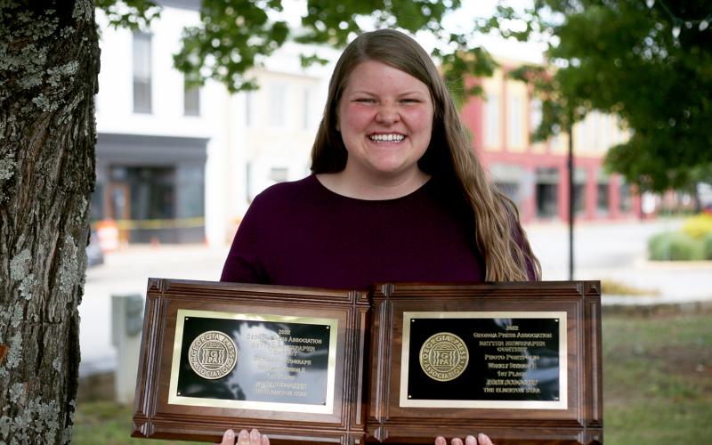 Editor Rose Scoggins took home first place out of all the weekly newspapers in the state for photo portfolio and first place in the The Star’s Division E for sports photo. (Photo by Evans)