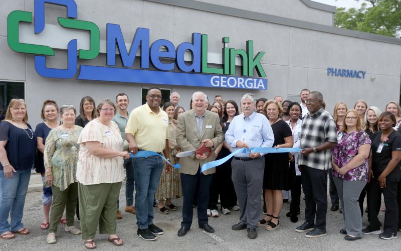 Medlink Bowman held a ribbon cutting for the facility’s new pharmacy Wednesday, June 29. The pharmacy will  be open to the entire community with Medlink patients receiving a discounted rate. The ribbon cutting included a host of Medlink Bowman and other Medlink Georgia staff and board members along with representatives from the Elbert County Chamber of Commerce and the City of Bowman. (Photo by Scoggins)