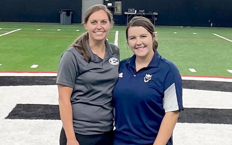 Head Athletic Trainer Sarah Fuller (left) and student assistant trainer Callie Moss (right) recently attended a free training course at the University of Georgia’s indoor athletic facility in Athens.